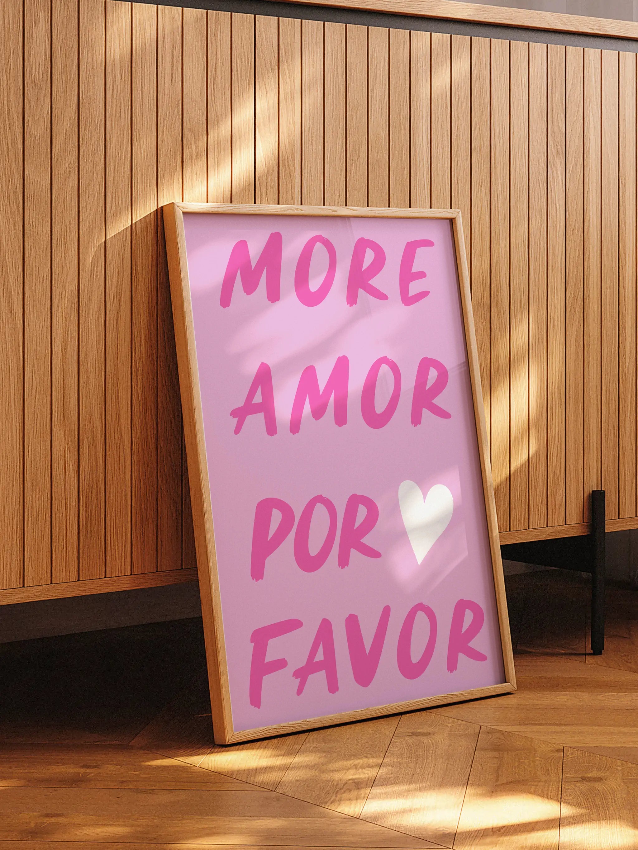 Romantic Spanish wall art with pink background and heart symbol